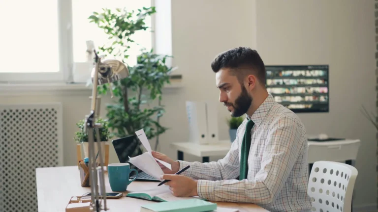 Man focused on work at desk