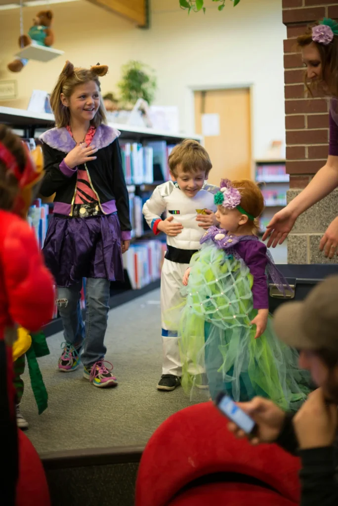 Children in costumes playing together